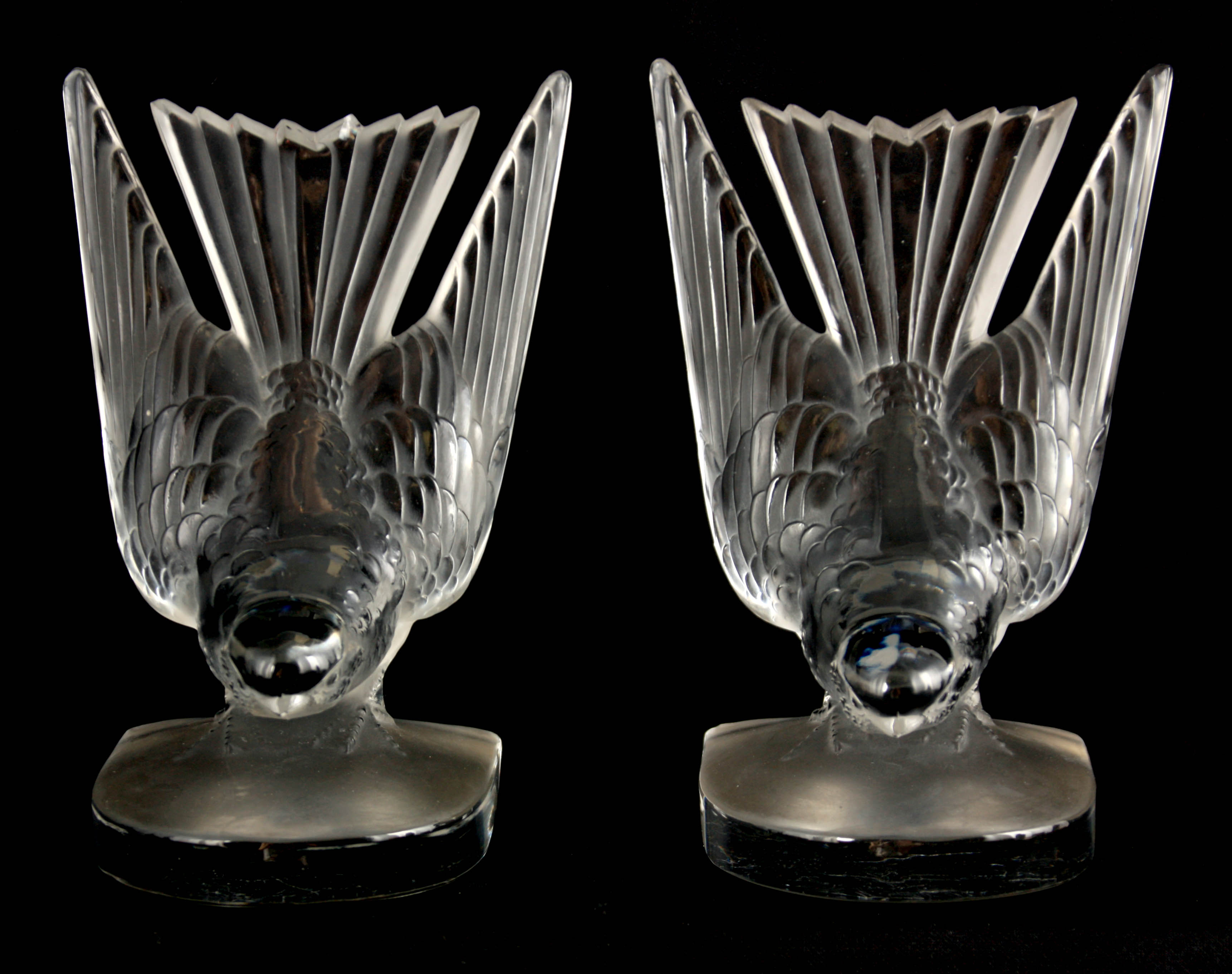 A 20TH CENTURY R. LALIQUE PAIR OF HIRONDELLES BOOKENDS - etched signature R. Lalique 15.5cm high