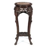 A GOOD 19TH CENTURY CHINESE CIRCULAR HIGHLY ORNATE CARVED HARDWOOD VASE STAND the inset marble top