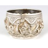 AN 18TH/19TH CENTURY INDIAN SILVER BOWL decorated with raised deities 12.5cm diameter 8cm high