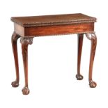 A MID 18TH CENTURY MAHOGANY CARD TABLE IN THE MANNER OF THOMAS CHIPPENDALE the figured top having