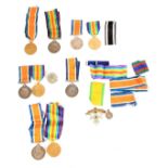 FOUR PAIRS OF WWI BRITISH WAR MEDALS all with engraved names around the edge, together with a single