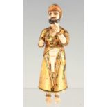 A RARE 19TH CENTURY INDIAN CARVED IVORY AND GILDED FIGURE 14cm high