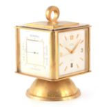 A LANCEL, 1950's SWISS GILT BRASS PORTABLE DESK CLOCK/WEATHER STATION the revolving cube body with