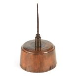 AN INTERESTING 18TH CENTURY LIGNUM VITAE TURNED BASE with moulded edge and threaded brass and iron