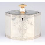 A GEORGE III PANELLED OVAL SILVER TEA CADDY with oval ivory finial, the body with floral engraved