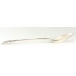 A GEORGE IV HEAVY QUEEN'S PATTERN SILVER BASTING SPOON 31cm overall London 1825 by William Chawner