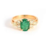 A LADIES 18CT YELLOW GOLD EMERALD AND DIAMOND RING with brilliant-cut emerald, app. 2.00ct,