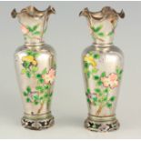 A PAIR OF 19TH CENTURY CHINESE SILVER AND ENAMEL VASES of shouldered tapering flared form with