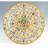 A 16TH CENTURY STYLE ITALIAN MAJOLICA CHARGER of traditional colouration with bands of all over