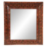 AN OVER-SIZED WILLIAM & MARY OYSTERED LABURNUM CUSHION FRAMED MIRROR with short-grained mouldings