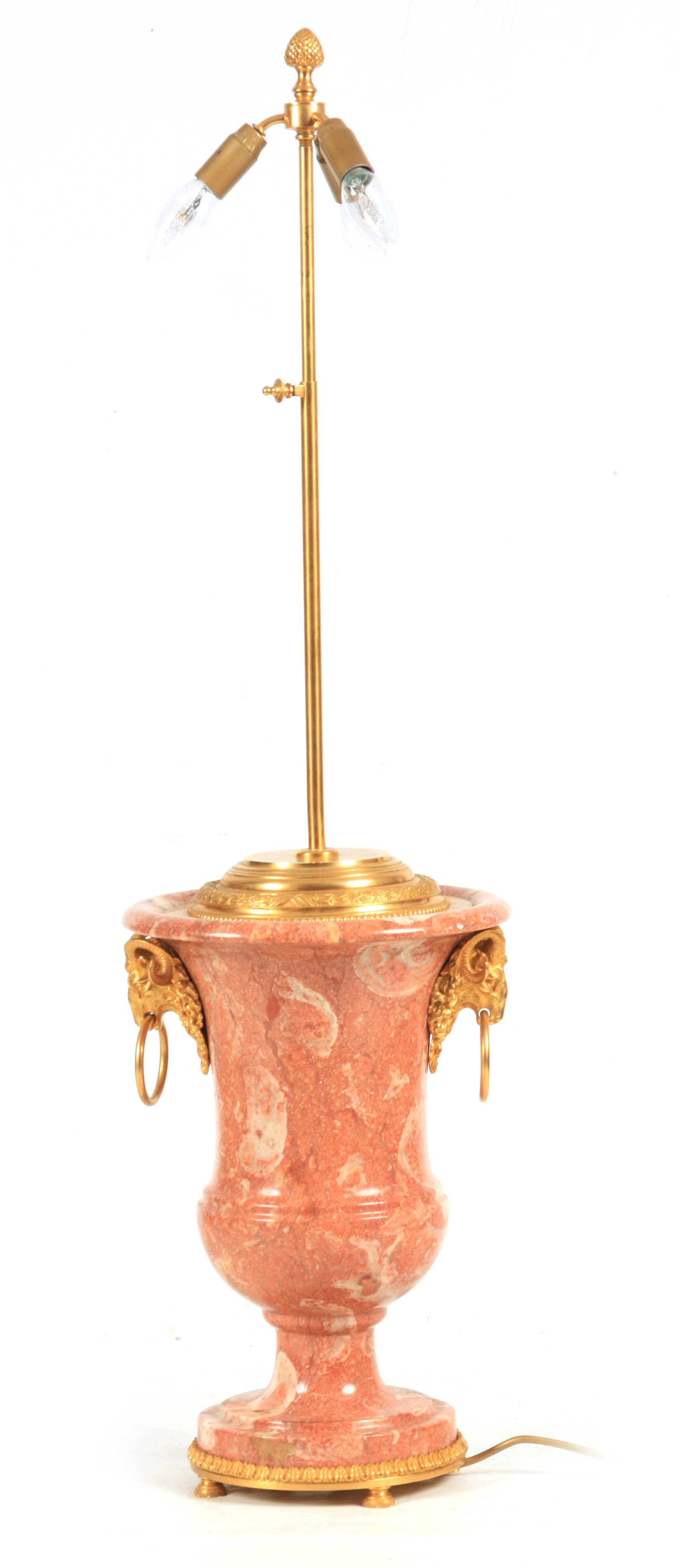 A 20TH CENTURY FRENCH MARBLE AND GILT BRASS TABLE LAMP with urn-shaped body and rams head side
