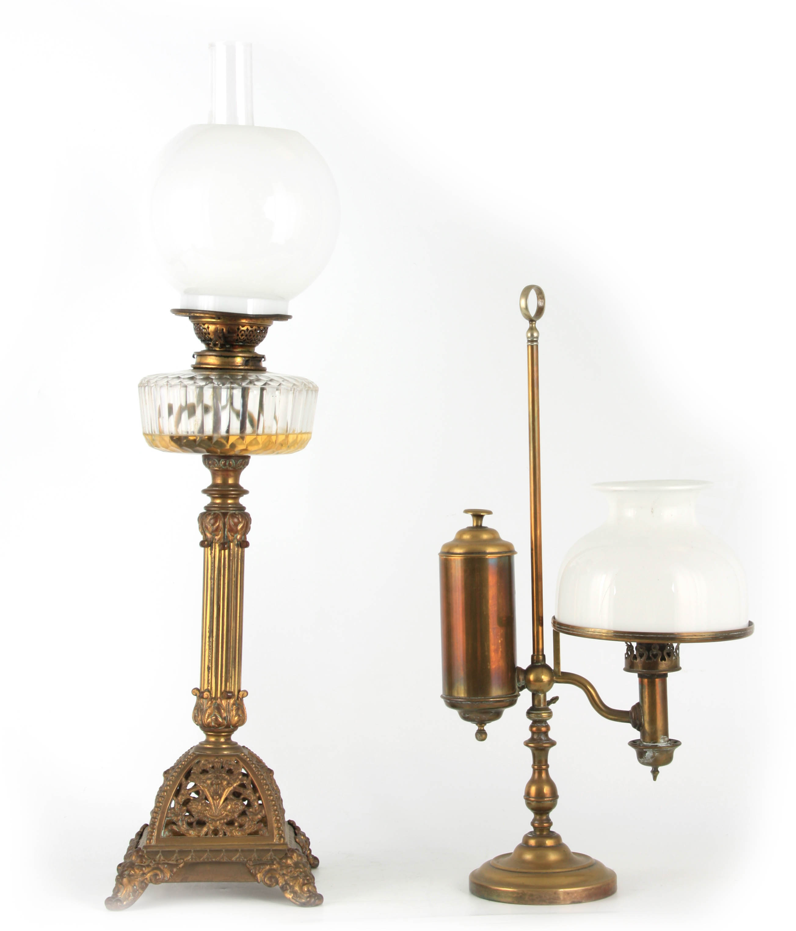 A VICTORIAN ORNATE CAST BRASS OIL LAMP with square footed pierced base, reeded leaf cast stem and