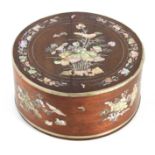 A 19TH CENTURY CHINESE HARDWOOD MOTHER OF PEARL CIRCULAR DRESSING TABLE BOX with lift-off top and