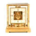 A JAEGER-LECOULTRE ATMOS CLOCK the gilt brass framed case with removable front glass panel enclosing