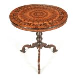 A 19TH CENTURY ITALIAN MARQUETRY AND PARQUETRY SPECIMEN WOOD INLAID TILT TOP TABLE with radiating