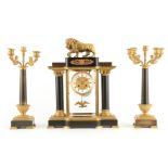 A LATE 19TH CENTURY BRASS AND PATINATED BRONZE CLOCK GARNITURE the four-glass style case