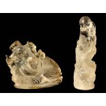 TWO SMALL ORIENTAL ROCK CRYSTAL FIGURES of dragon and elephant's head design 6cm high 8cm wide and