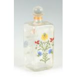 A LATE 19TH CENTURY FRENCH CLEAR GLASS SQUARE DECANTER OVERLAID WITH FLORAL ENAMELS having a bulbous