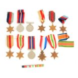 A COLLECTION OF WWII MEDALS together with the original list from the secretary of the Admiralty