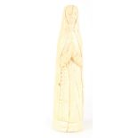 A 19TH/EARLY 20TH CENTURY CARVED IVORY TUSK FIGURE depicting a nun 27.5cm high