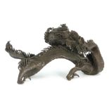 A MEIJI PERIOD JAPANESE BRONZE INCENSE BURNER modelled as a slender dragon holding a vessel 26cm