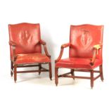 A PAIR OF GEORGE III RED LEATHER UPHOLSTERED MAHOGANY GAINSBOROUGH CHAIRS with camel shaped backs