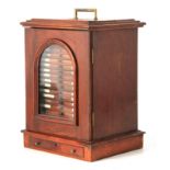 A COLLECTION OF LATE 19TH CENTURY MICROSCOPE SLIDES fitted in a glazed mahogany case with flush