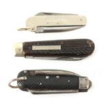 A COLLECTION OF THREE FOLDING KNIVES - a military knife with chequered grip by Richards,
