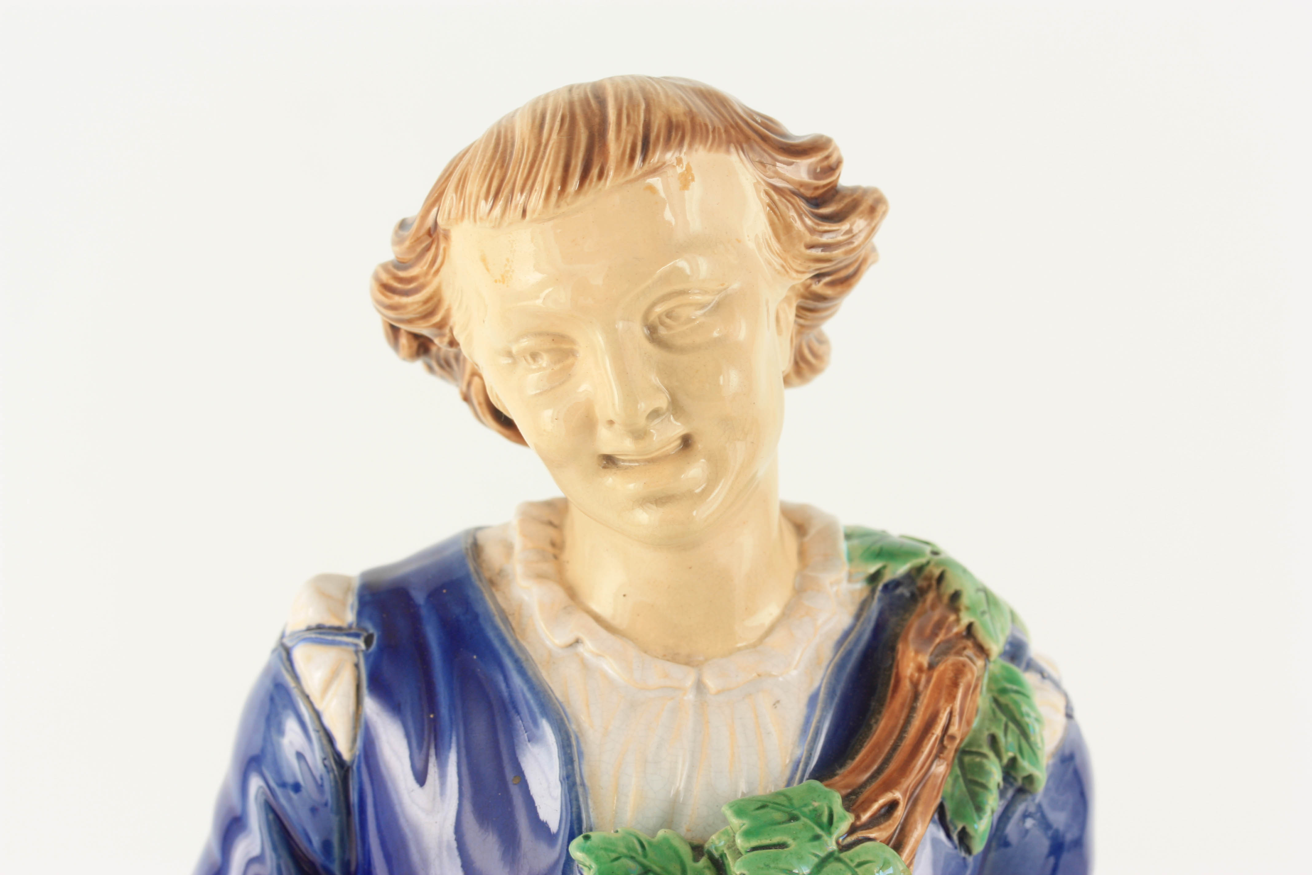 A 19TH CENTURY MINTON MAJOLICA FIGURE finely modelled as a young man carrying baskets coloured in - Image 3 of 8