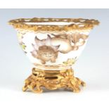 A GOOD 19TH CENTURY FRENCH ORMOLU MOUNTED CENTREPIECE with octagonal relief moulded body decorated