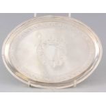 A GEORGE III OVAL BRIGHT CUT ENGRAVED SILVER TEAPOT STAND with fine swag border and floral inner