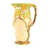 A 1930's/40's CARLTON WARE LARGE JUG the ribbed bulbous body decorated in relief in the oak tree