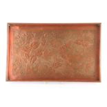 A 1900's KESWICK SCHOOL STYLE RECTANGULAR TRAY embossed with designs of honeysuckle, foliage and