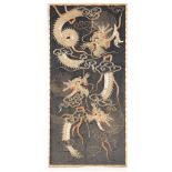 AN EARLY 20TH CENTURY CHINESE EMBROIDERED PANEL of three raised gold and silver thread entwined
