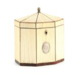 A GEORGE III TORTOISESHELL AND IVORY OCTAGONAL TENT TOP TEA CADDY with monogrammed silver