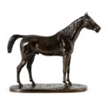 A 19TH CENTURY PATINATED BRONZE SCULPTURE OF A STANDING HORSE finely modelled and mounted on a