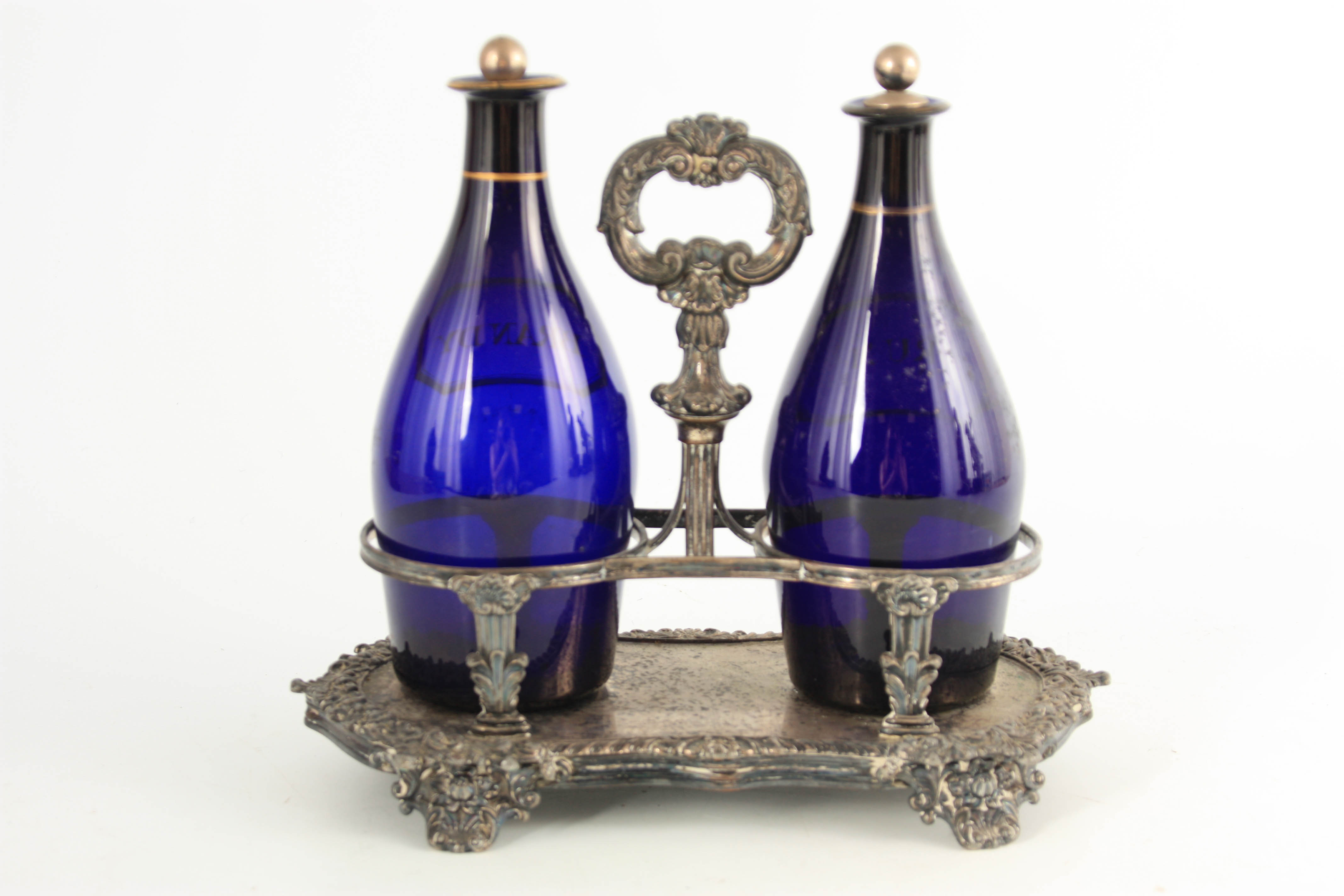 TWO EARLY 19TH CENTURY BRISTOL BLUE DECANTERS FOR RUM AND BRANDY mounted in an old Sheffield plate - Image 4 of 4