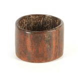 AN 18TH CENTURY LIGNUM VITAE TREEN DUG OUT POT having superb colour and patination 8cm high 11.5cm