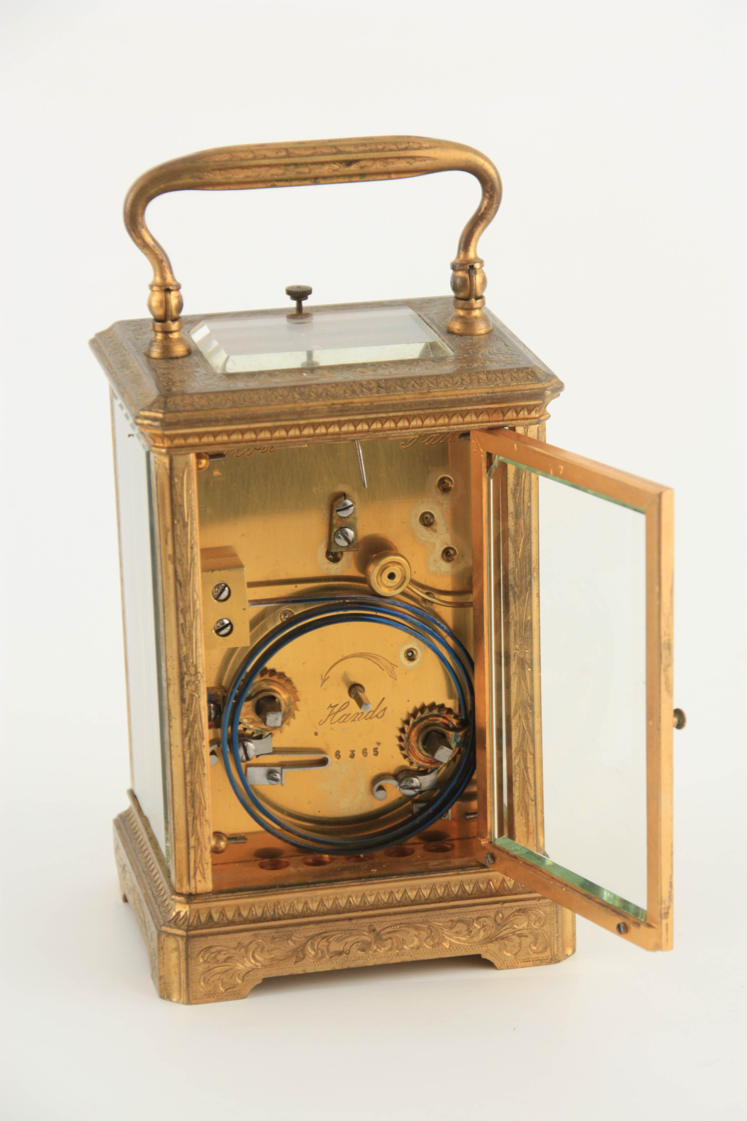 A LATE 19TH CENTURY FRENCH MASK DIAL ENGRAVED GILT BRASS REPEATING CARRIAGE CLOCK the full floral - Image 7 of 8
