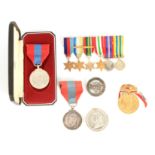 A COLLECTION OF MEDALS to include two service medals, a group of six miniatures, two Coronation