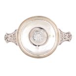 A GEORGE VI COMMEMORATIVE SILVER QUAICH with Celtic design handles 14.3cm across London 1936 by