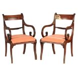 A PAIR OF REGENCY SABRE LEGGED OPEN ARMCHAIRS with geometric shaped bar backs and barley-twist