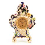 VULLIAMY, LONDON. NO.1188 A LATE REGENCY COALPORT PORCELAIN FUSEE MANTEL CLOCK the gilt and