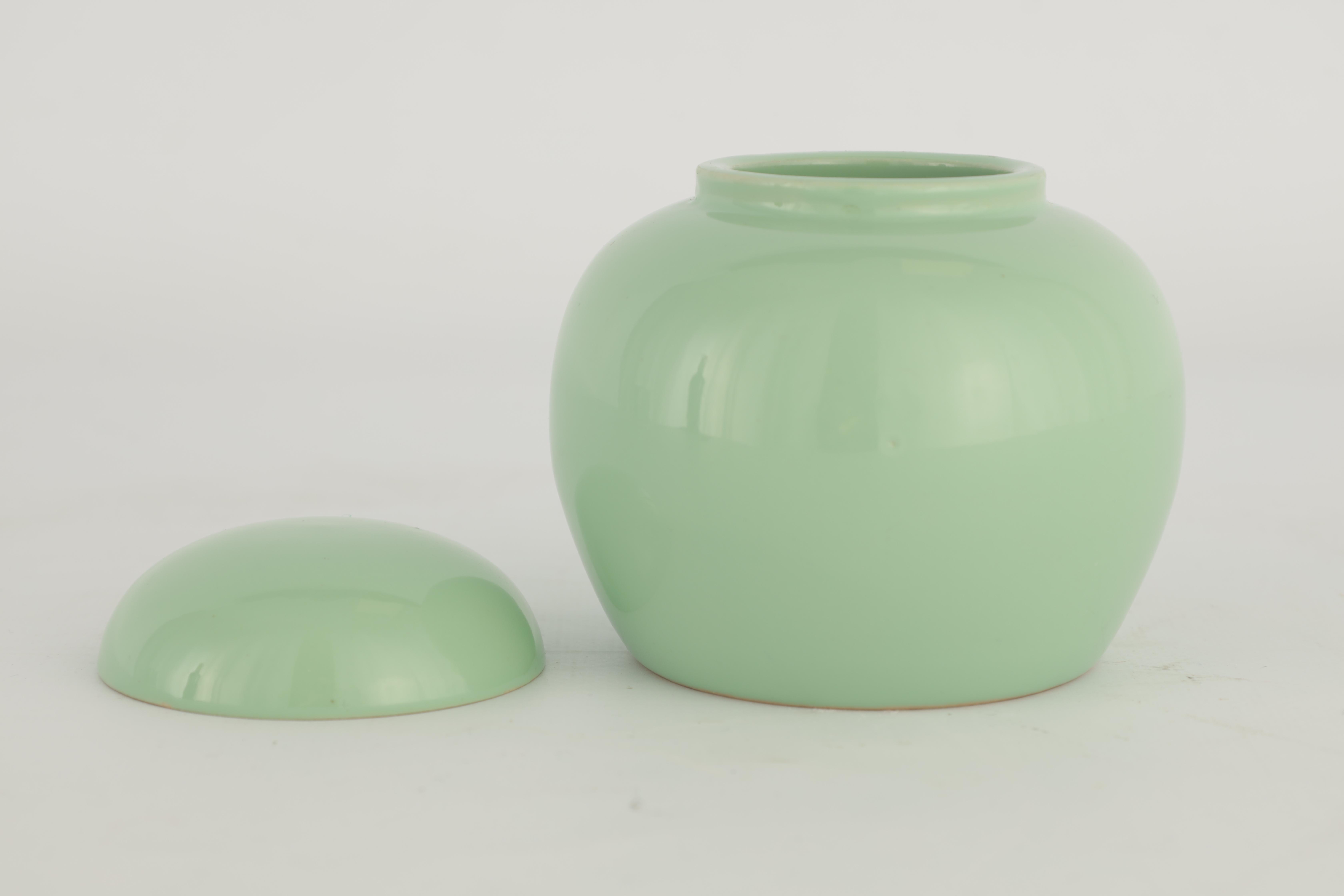 AN UNUSUAL DOULTON LAMBETH ENGLAND PALE GREEN GLAZED SMALL BULBOUS JAR AND COVER 9cm high, impressed - Image 4 of 5