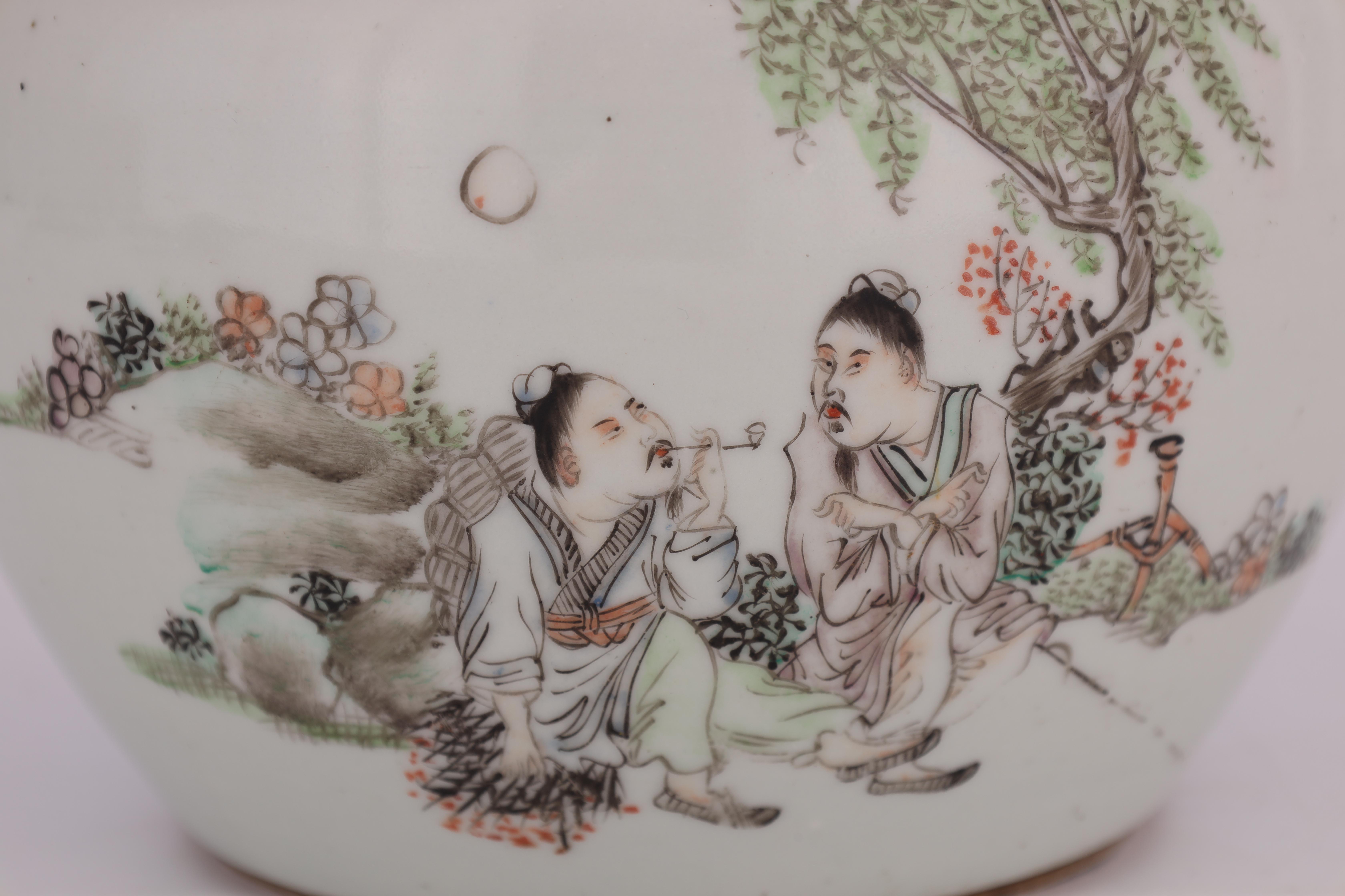 AN 18TH CENTURY CHINESE PORCELAIN FOOD JAR AND COVER decorated with figures in a tree lined - Image 3 of 11