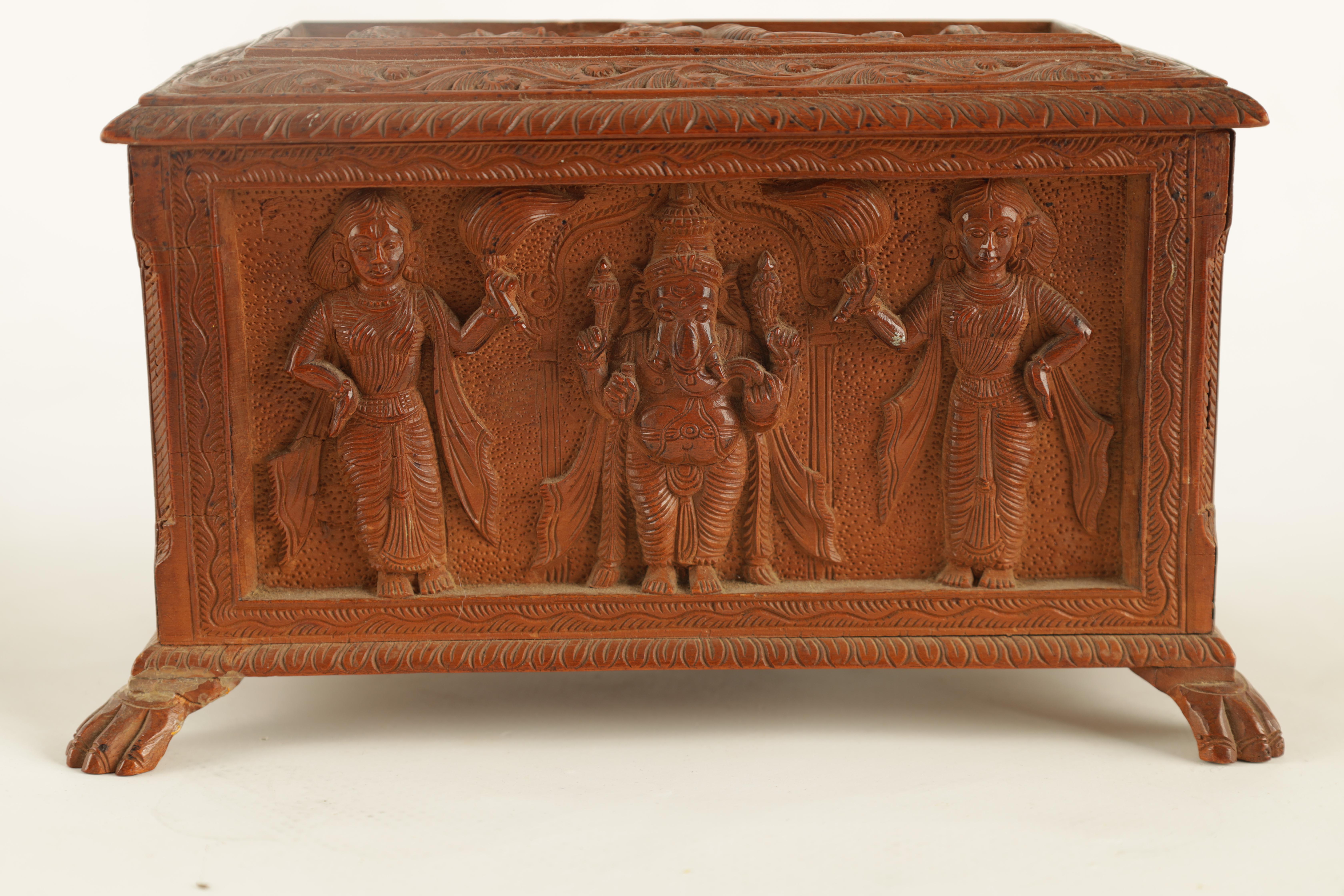 AN EARLY 20TH CENTURY ANGLO-INDIAN CARVED SANDALWOOD BOX with relief carved panels of various Indian - Image 3 of 8