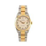 A GENTLEMAN'S STEEL AND 18CT GOLD ROLEX OYSTER PERPETUAL DATEJUST WRISTWATCH having an ivory pyramid