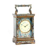 A LATE 19TH CENTURY FRENCH CHAMPLEVE ENAMEL STRIKING CARRIAGE CLOCK the case covered in champleve