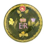 A MOORCROFT 1952-1977 ERII SILVER JUBILEE PLATE decorated with the four-country emblems on a