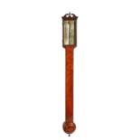SHUTTLEWORTH, LONDON A GEORGE III MAHOGANY STICK BAROMETER with swan neck pediment above a glazed